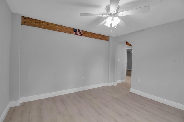 7 Georgia Ave, Crystal Beach, FL 34681 - unfurnished room featuring baseboards, ceiling fan, and light wood finished floors