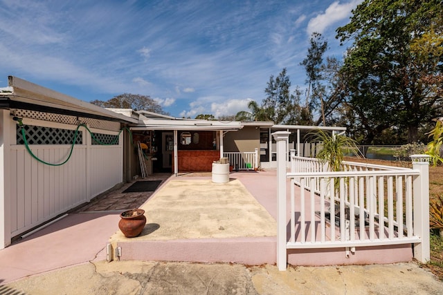 exterior space featuring a patio and fence