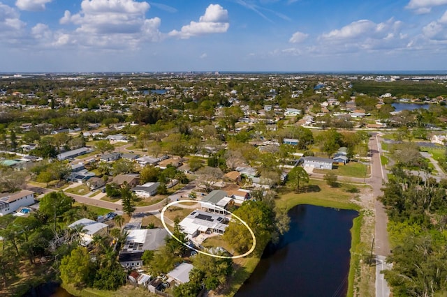 aerial view featuring a water view and a residential view