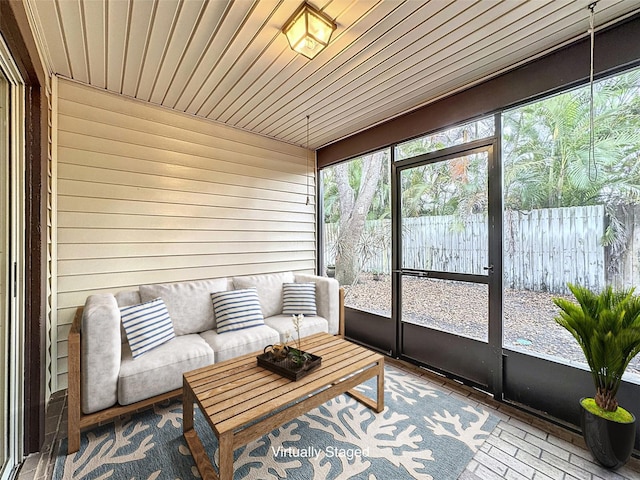 sunroom with wooden ceiling