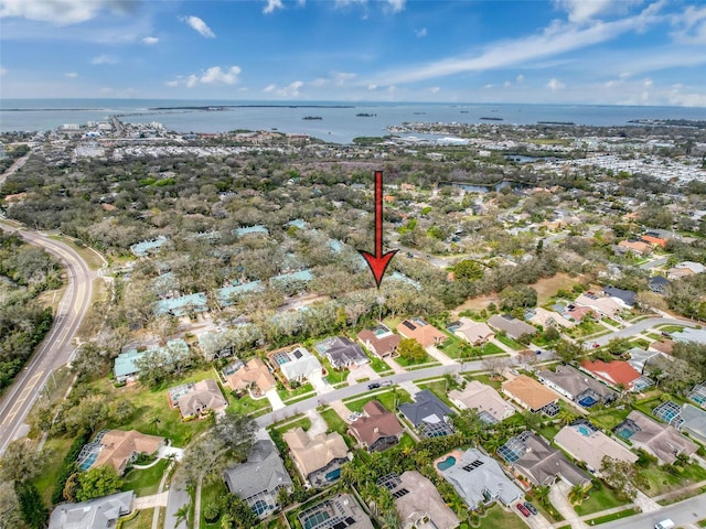 aerial view featuring a water view and a residential view