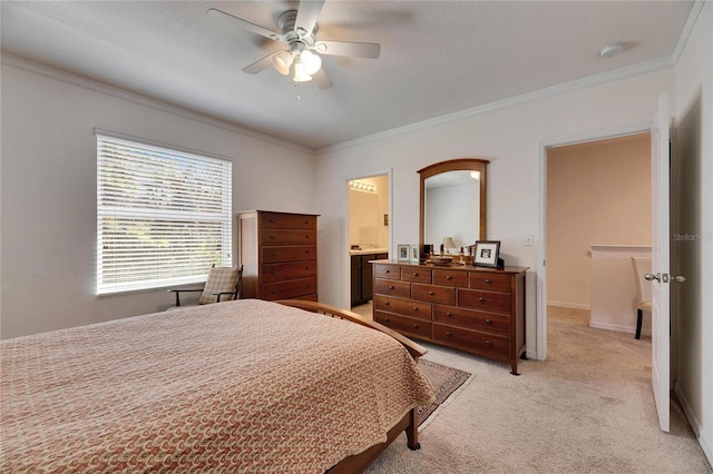 bedroom featuring a ceiling fan, crown molding, light colored carpet, and baseboards