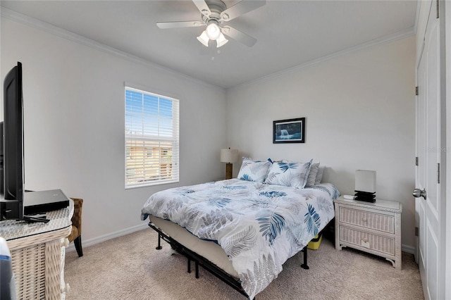 bedroom featuring ceiling fan, light colored carpet, baseboards, and ornamental molding