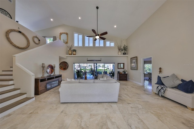 living area with high vaulted ceiling, stairway, a ceiling fan, and recessed lighting