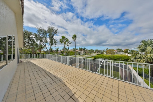 view of patio featuring a water view