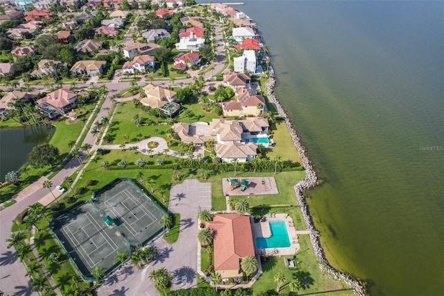 aerial view with a residential view and a water view