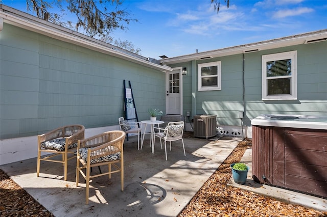 view of patio with central AC unit