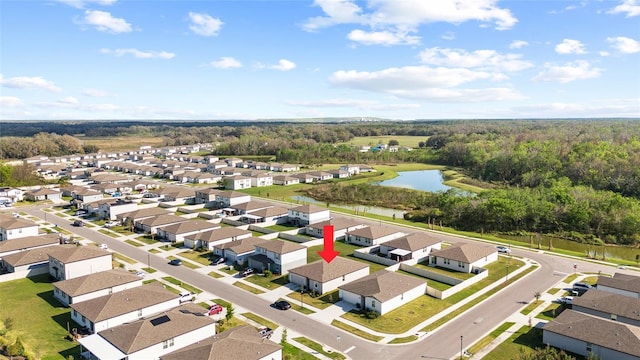 bird's eye view with a water view and a residential view