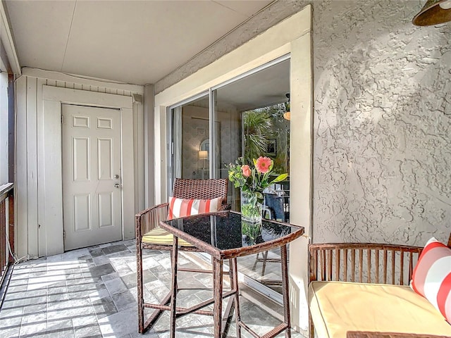 balcony featuring outdoor dining space