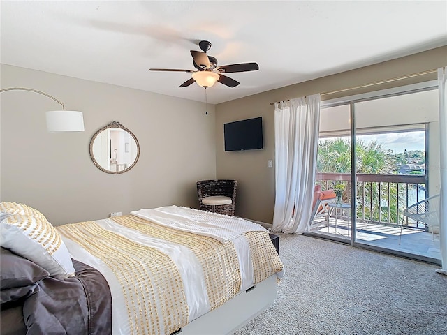 carpeted bedroom featuring access to outside and a ceiling fan