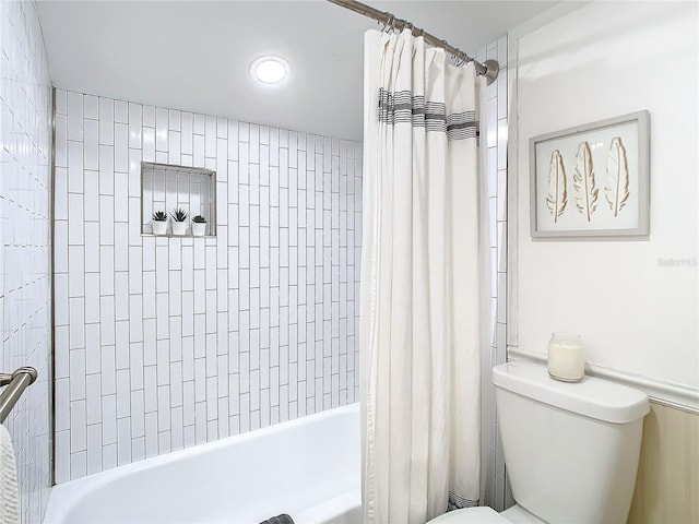 full bathroom with toilet and shower / tub combo with curtain