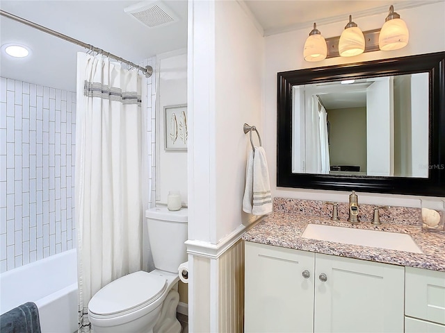 bathroom featuring toilet, visible vents, shower / bath combination with curtain, and vanity