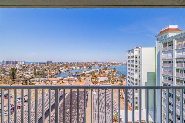 balcony featuring a water view