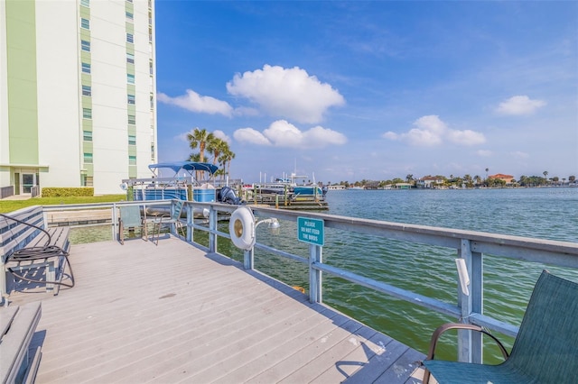 dock area featuring a water view