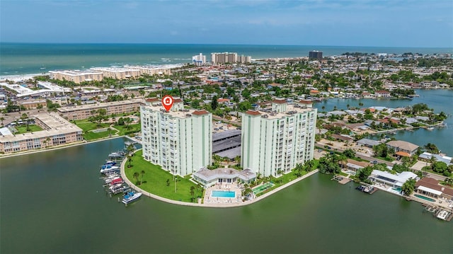 bird's eye view featuring a view of city and a water view