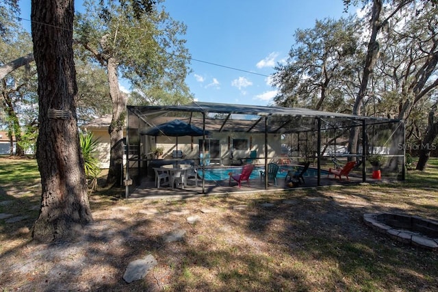 exterior space with an outdoor pool