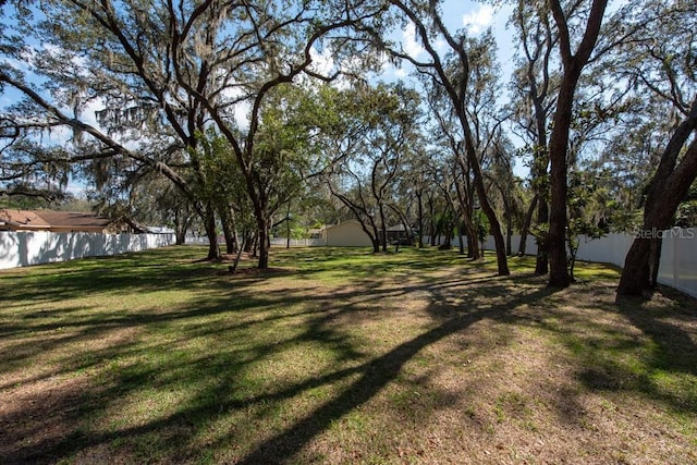 view of yard featuring fence