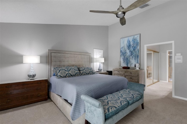 bedroom with visible vents, carpet flooring, vaulted ceiling, ceiling fan, and baseboards