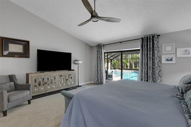 bedroom with access to exterior, carpet flooring, vaulted ceiling, a textured ceiling, and ceiling fan