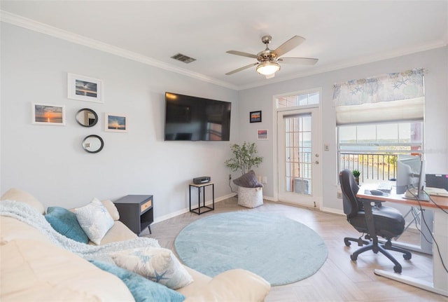 interior space with ceiling fan, wood finished floors, visible vents, baseboards, and crown molding