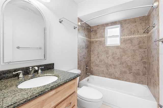 full bath with shower / washtub combination, toilet, and vanity