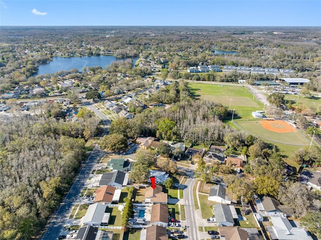 drone / aerial view with a water view