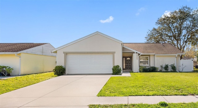 ranch-style home featuring a garage, concrete driveway, a front yard, and stucco siding