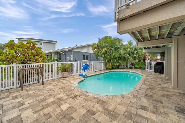 17404 1st St E, Redington Shores, FL 33708 - view of pool with a patio area and fence