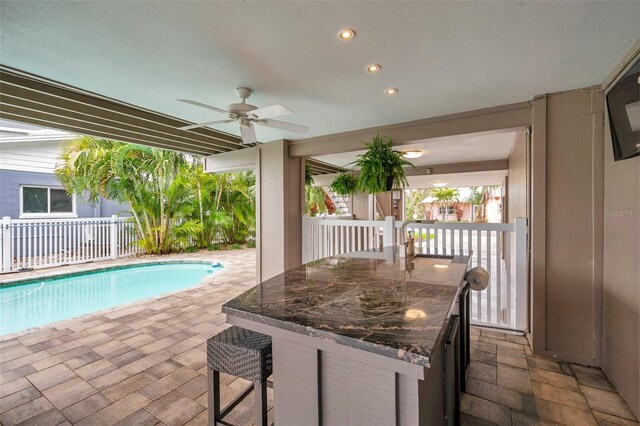 17404 1st St E, Redington Shores, FL 33708 - view of swimming pool with a ceiling fan and a patio area