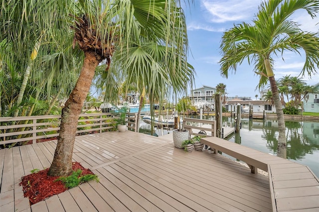 17404 1st St E, Redington Shores, FL 33708 - dock area featuring boat lift and a water view