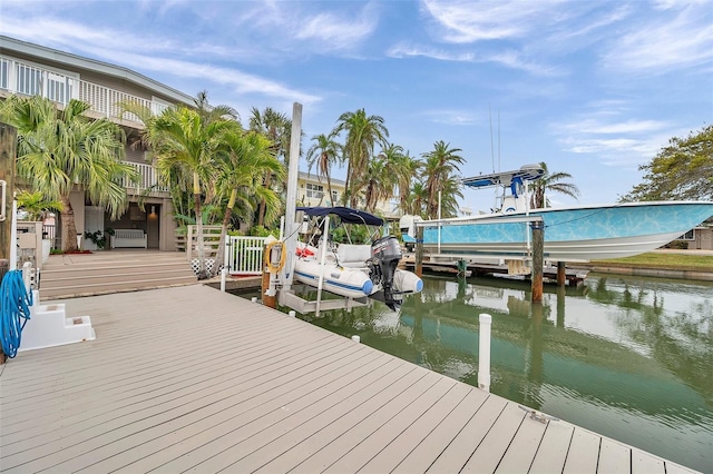 17404 1st St E, Redington Shores, FL 33708 - dock area featuring boat lift and a water view