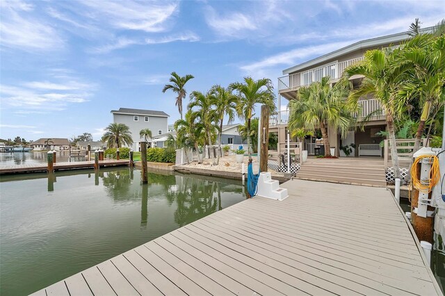 17404 1st St E, Redington Shores, FL 33708 - dock area featuring a balcony and a water view