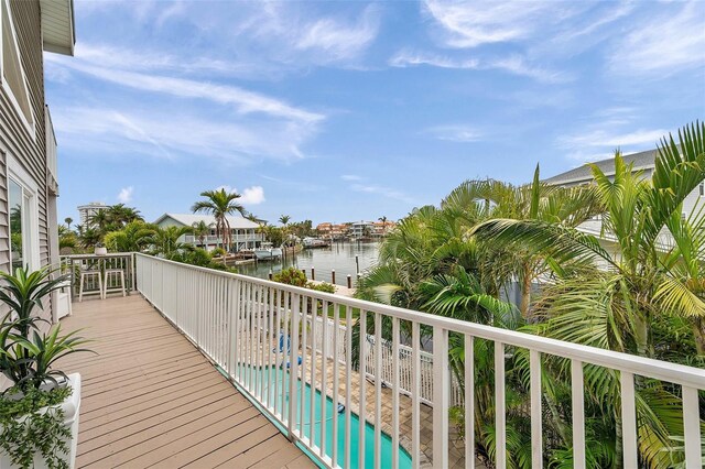 17404 1st St E, Redington Shores, FL 33708 - balcony with a water view and view of pool area