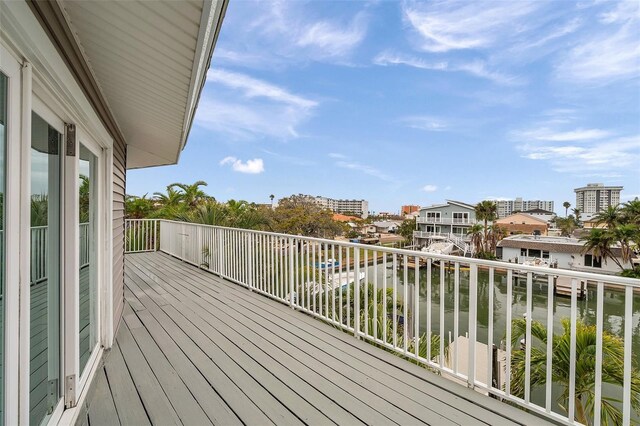 17404 1st St E, Redington Shores, FL 33708 - wooden terrace featuring a water view