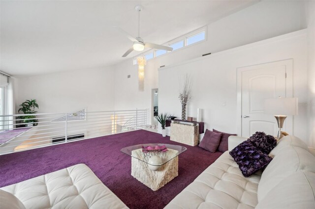 17404 1st St E, Redington Shores, FL 33708 - carpeted living room featuring plenty of natural light, a ceiling fan, and high vaulted ceiling
