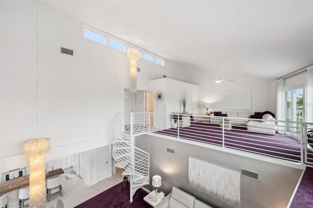17404 1st St E, Redington Shores, FL 33708 - living room featuring healthy amount of natural light and ceiling fan