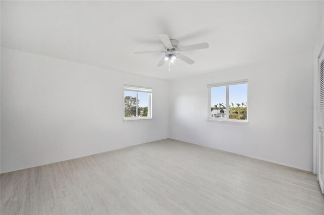 17404 1st St E, Redington Shores, FL 33708 - spare room with a ceiling fan and wood finished floors