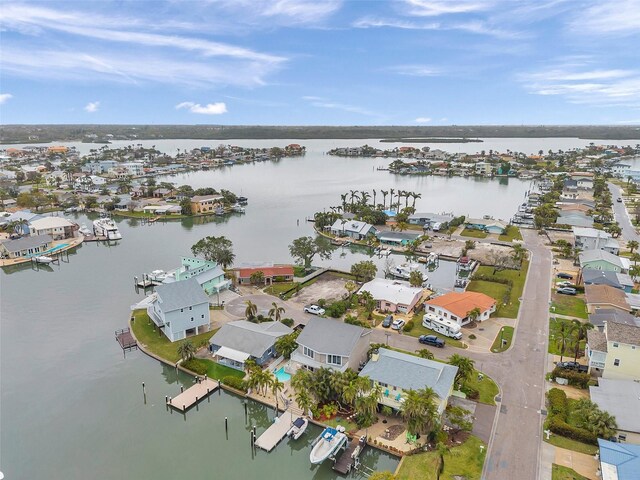 17404 1st St E, Redington Shores, FL 33708 - aerial overview of property's location with a nearby body of water and nearby suburban area