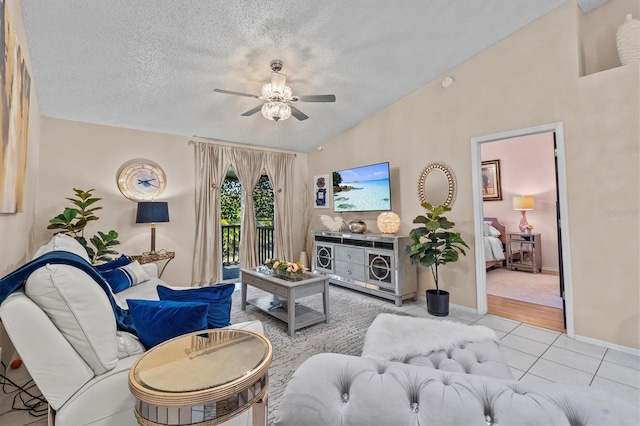 tiled living room featuring lofted ceiling, a textured ceiling, a ceiling fan, and baseboards