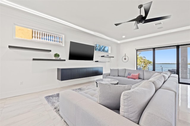 living area featuring visible vents, ceiling fan, and baseboards