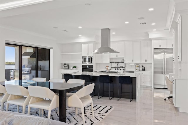 dining room featuring crown molding, recessed lighting, and visible vents