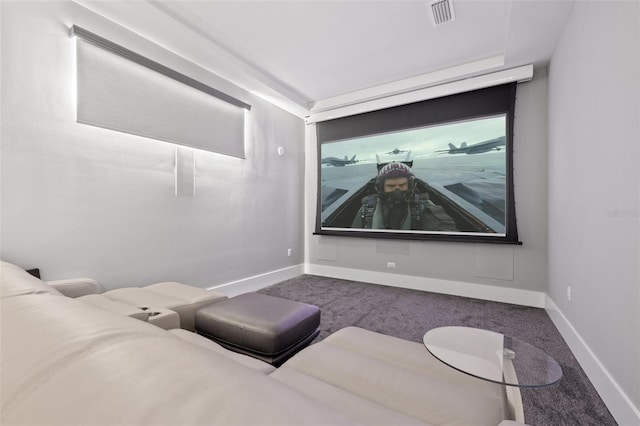 carpeted cinema room with baseboards and visible vents