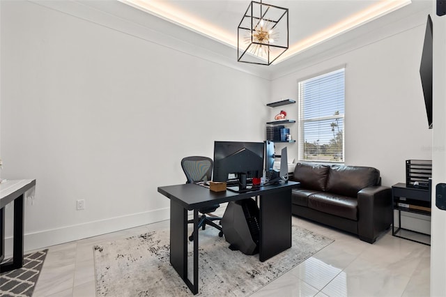 office with a notable chandelier, a raised ceiling, and baseboards