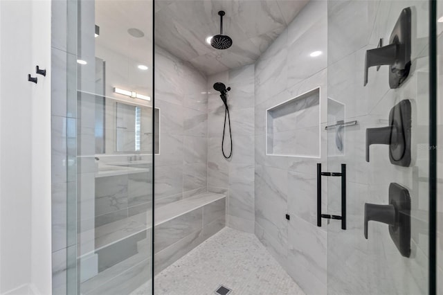 bathroom with a stall shower