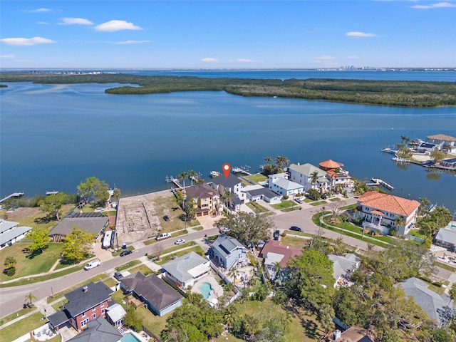 aerial view with a residential view and a water view