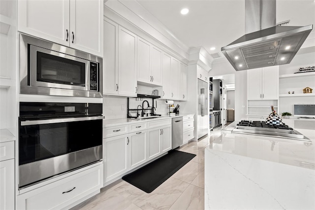 kitchen featuring white cabinetry, island exhaust hood, built in appliances, and open shelves