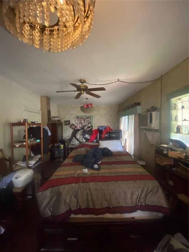 bedroom with ceiling fan with notable chandelier and lofted ceiling