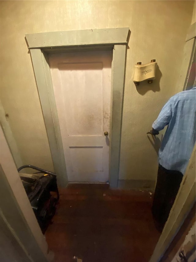 doorway featuring dark wood-style floors