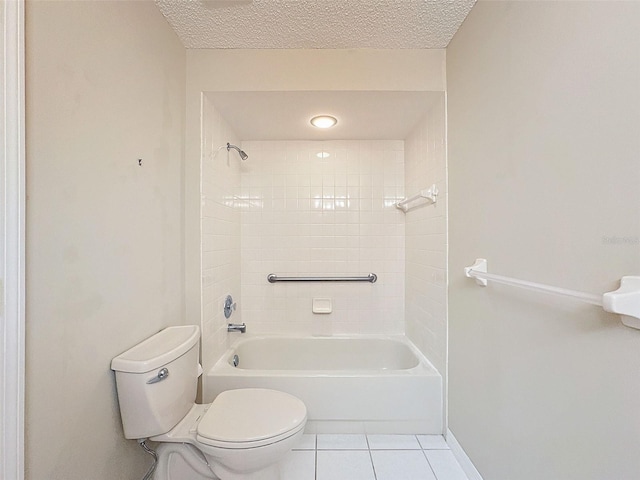 bathroom with shower / bath combination, baseboards, toilet, tile patterned floors, and a textured ceiling