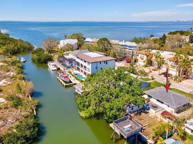 aerial view with a residential view and a water view